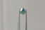 Opalescent teal lime green natural pear cut sapphire. This magical sapphire is available at The North Way Studio to be added to a custom heirloom setting.