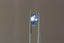 A medium periwinkle blue shield cut sapphire