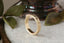 Engraved 5mm wedding band with leaf design.
