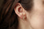 Hand-carved leaf and natural emerald stud earrings. Everyday stud earrings.