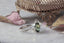 This forest fairy engagement ring features a dark green natural oval brilliant cut Australian sapphire, two marquise diamonds, and a rustling of leaves and bark texture hand-carved into reclaimed 18 karat white gold. This enchanted garden engagement ring is ready to ship, size 6 1/2. Crafted by The North Way Studio in collaboration with Claire Pettibone.