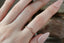 Natural antique-inspired diamond contoured stacking ring.