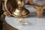 A timeless fairytale alternative engagement ring crafted by The North Way Studio. This fantasy inspired solitaire ring features hand-carved leaf details, claw prongs, and a custom center stone. The customizable ring is shown in reclaimed yellow gold and lab grown oval diamond.