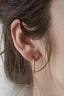 Everyday yellow gold hoop earrings with hand-carved leaves.