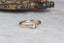A solitaire ring inspired by antique collet settings in 14 karat yellow gold and natural Montana sapphire