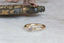 A solitaire ring inspired by antique collet settings in 14 karat yellow gold and natural Montana sapphire