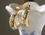 Everyday solid 10 karat yellow gold wide hoop earrings with hand-carved Indigo flowers