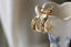 Everyday hand-carved 10 karat yellow gold hoop earrings