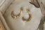 Everyday solid 10 karat yellow gold wide hoop earrings with hand-carved Indigo flowers
