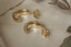 Everyday solid 10 karat yellow gold wide hoop earrings with hand-carved Indigo flowers