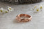 A rose gold medieval floral signet band inspired by Joan of Arc