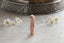 A rose gold medieval floral signet band inspired by Joan of Arc