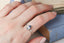 Arwen style engagement ring in reclaimed 14 karat white gold and natural blue pear cut sapphire and marquise cut diamonds. Three stone elven leaf engagement ring.