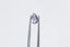 A faintly silky purple and pink natural pear cut sapphire available at The North Way Studio to be added to your custom heirloom setting.
