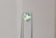 Opalescent teal lime green natural pear cut sapphire. This magical sapphire is available at The North Way Studio to be added to a custom heirloom setting.