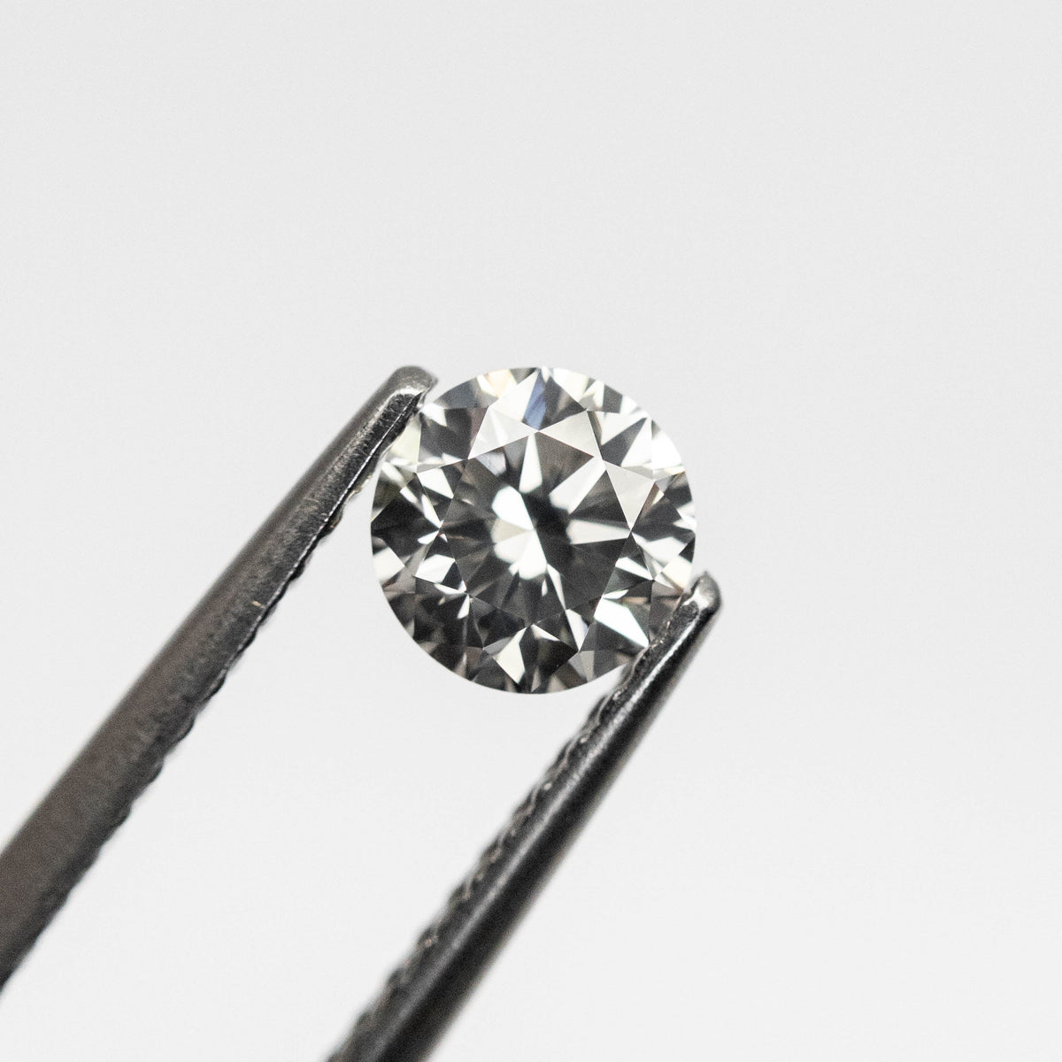 0.50ct 4.95-4.98x3.23mm VS1 Fancy Grey Round Brilliant 18968-07