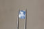 A silky pale blue opalescent sapphire