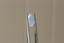 A silky opalescent pale blue pear cut sapphire