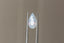 A large opalescent pale blue pear cut sapphire