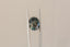 A natural multi-colored cushion cut sapphire with gorgeous hues of teal, green, faint ochre, and a hint of burgundy brown. This 4.12 carat color shifting sapphire is available to add to a custom heirloom setting at The North Way Studio.