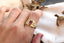 The Ether Gate ring by The North Way Studio in natural 1.05 carat ruby and reclaimed 18 karat yellow gold. Shown on the hand. 