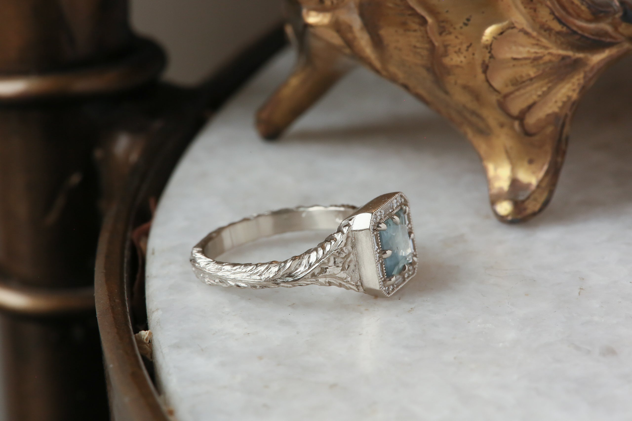 The Spire Signet Ring in Natural Blue Princess Cut Montana Sapphire and Diamond Halo