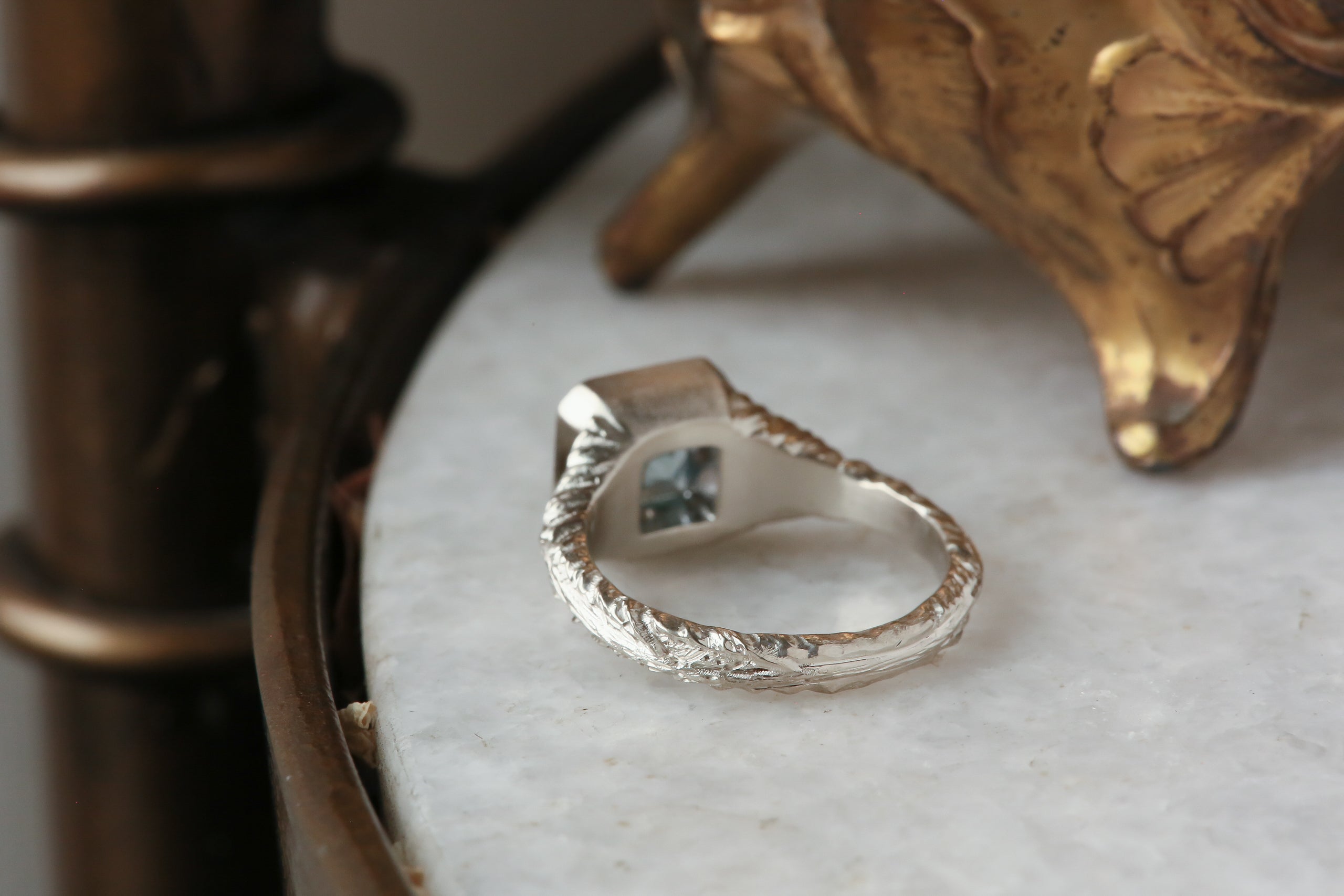 The Spire Signet Ring in Natural Blue Princess Cut Montana Sapphire and Diamond Halo