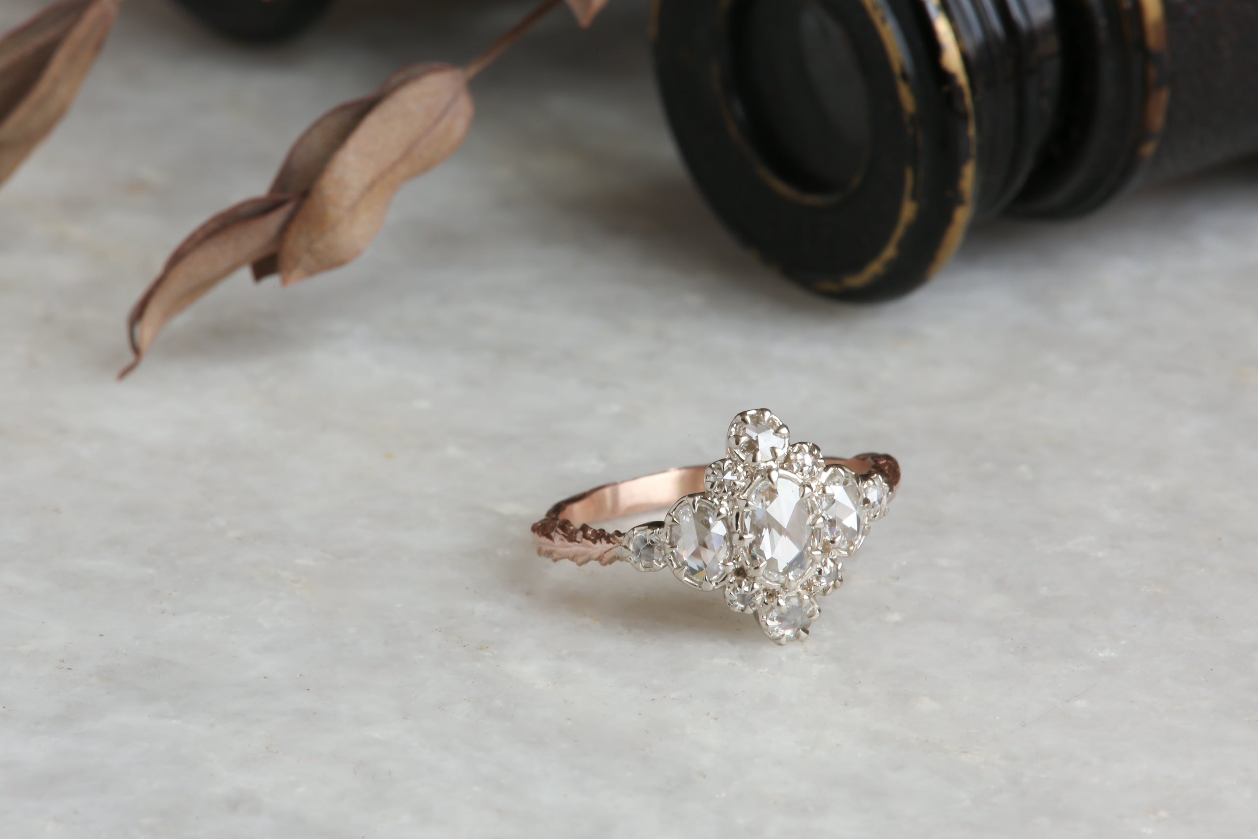 Natural rose cut diamond cluster ring in dual-toned 14 karat white and rose gold, low profile antique engagement ring. 