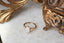 A ready to ship fairytale nature inspired engagement ring in 14 karat yellow gold and lab grown diamond