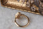 Ready to ship fantasy three stone engagement ring in oval brilliant cut lab grown diamonds and engraved, reclaimed 14 karat yellow gold by The North Way Studio. Size 6 1/2. 