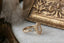 Three stone fantasy engagement ring featuring oval lab grown diamonds and medieval inspired engravings in reclaimed fine gold. A customizable engagement ring designed and crafted by The North Way Studio. This enchanting ring is shown in 14 karat yellow gold.
