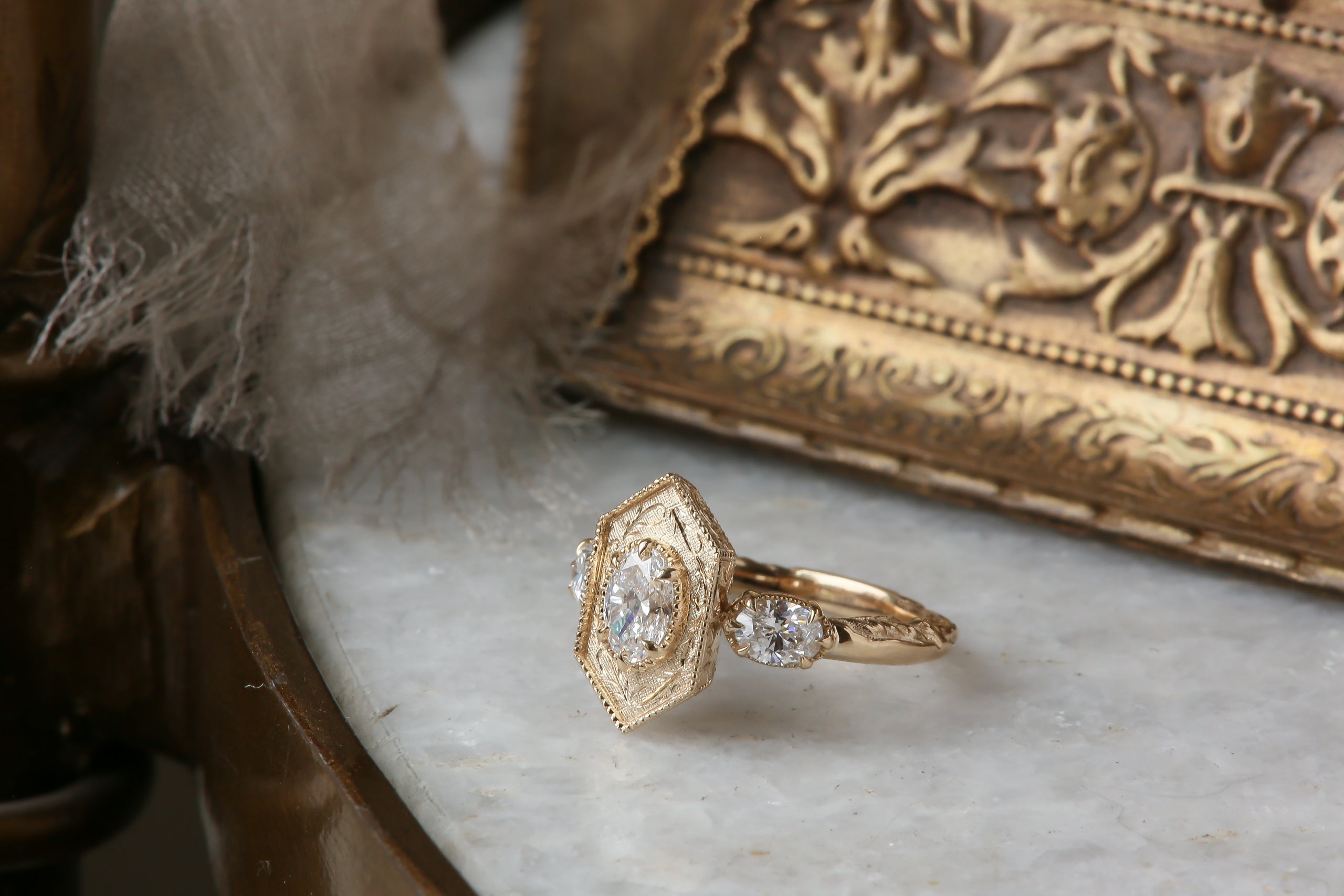 The Hidden Gate En Trois Ring in Lab Grown Oval Diamond Three