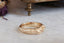 A hand-carved floral signet ring inspired by medieval jewelry and Joan of Arc. 