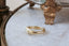 An antique inspired wide flower signet band. Hand-carved lavender flower for protection. Ready to ship in 10 karat yellow gold with a soft brushed finish.