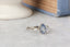 High fantasy engagement ring. Three stone sapphire ring cast in white gold with leaf and bark texture.