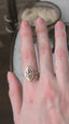 A Helm Setting with rose cut lab grown diamond by The North Way Studio. Shown in a video on the hand in yellow gold. 