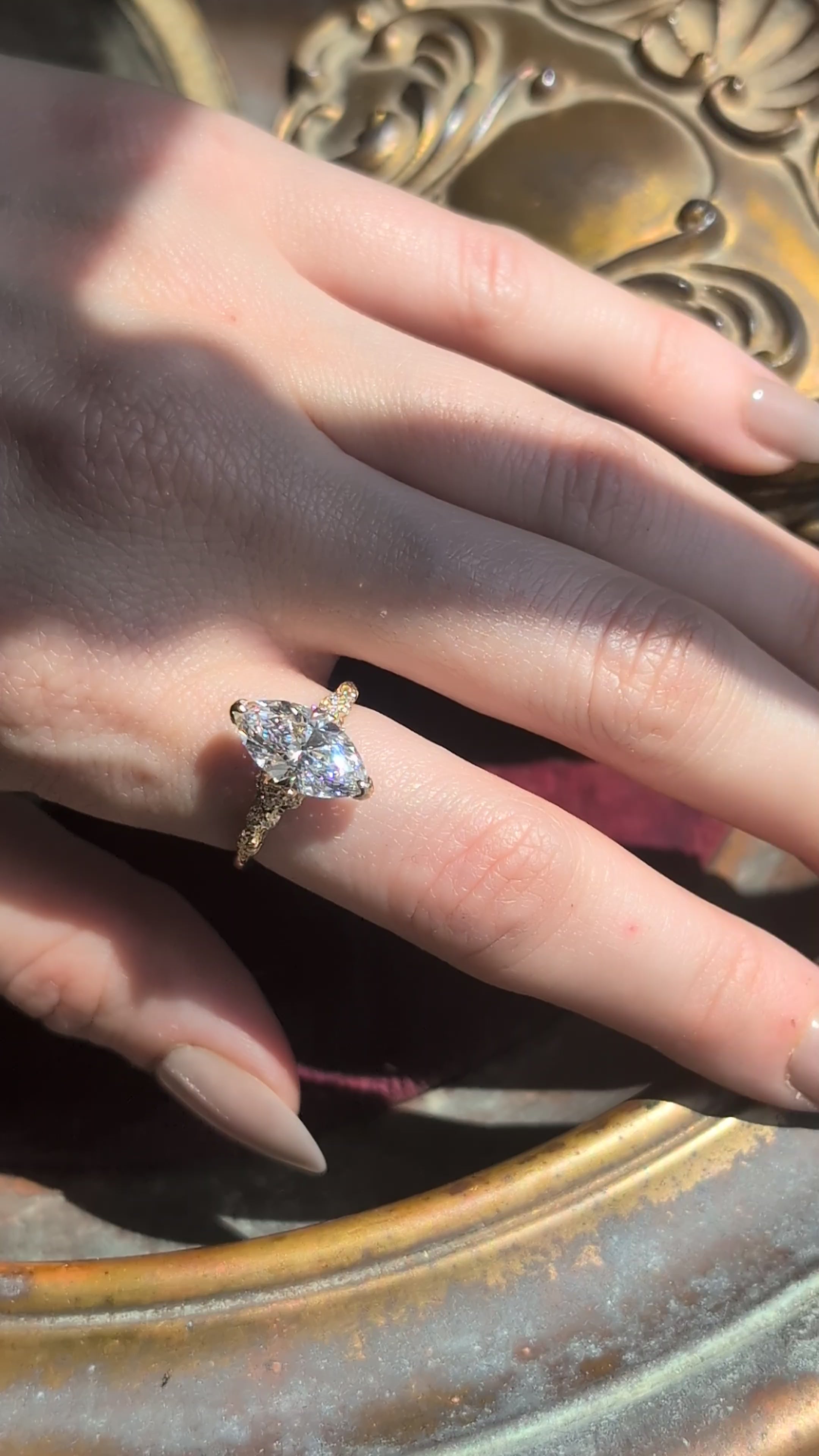 The Belladonna Solitaire Heirloom Setting with brilliant cut lab grown diamond by The North Way Studio shown upon the hand in a video. 