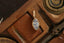 The Hag Stone pendant in reclaimed 14 karat yellow gold with opalescent marquise cut sapphire. 