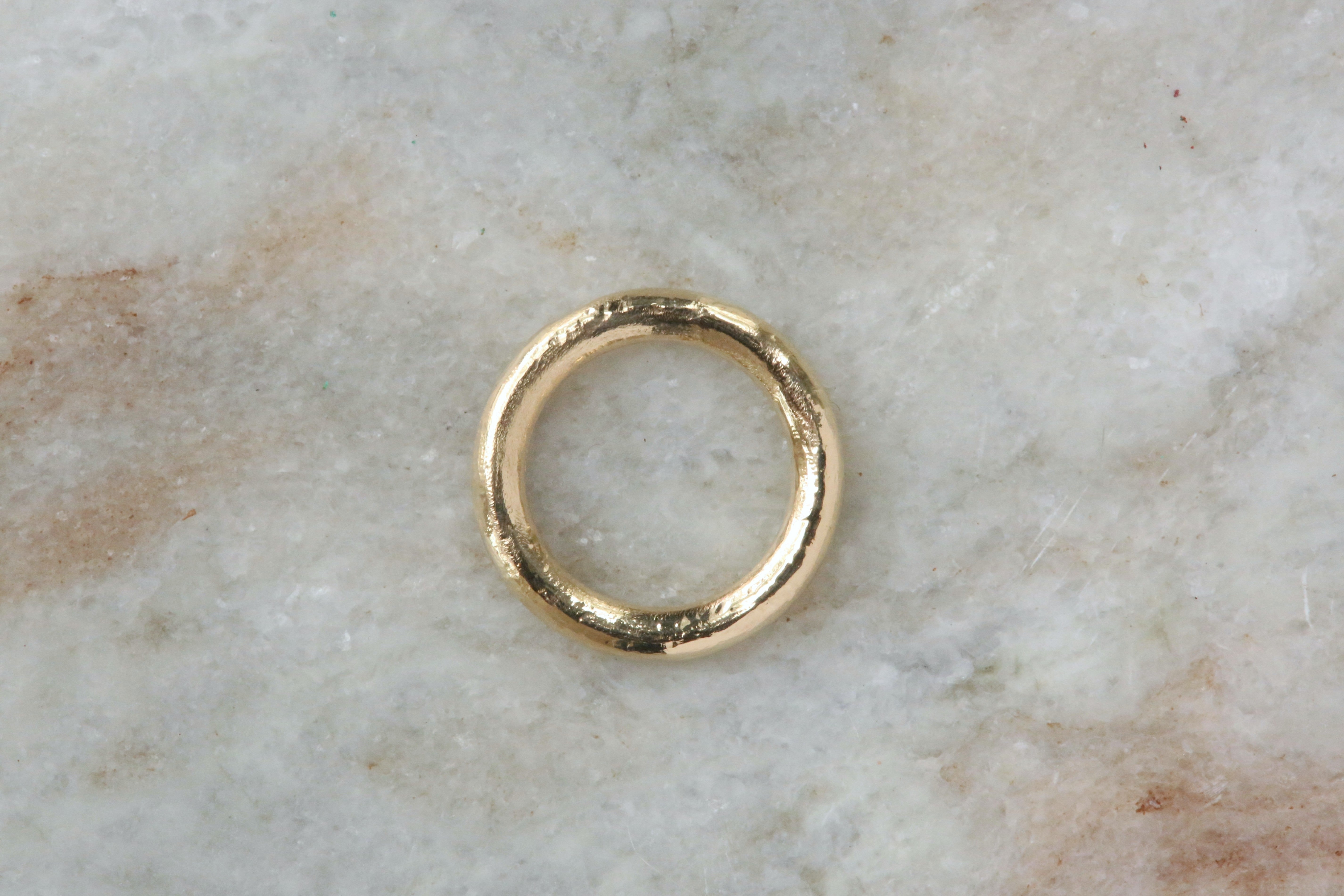 3mm round pinky ring in reclaimed 14 karat yellow gold. 
