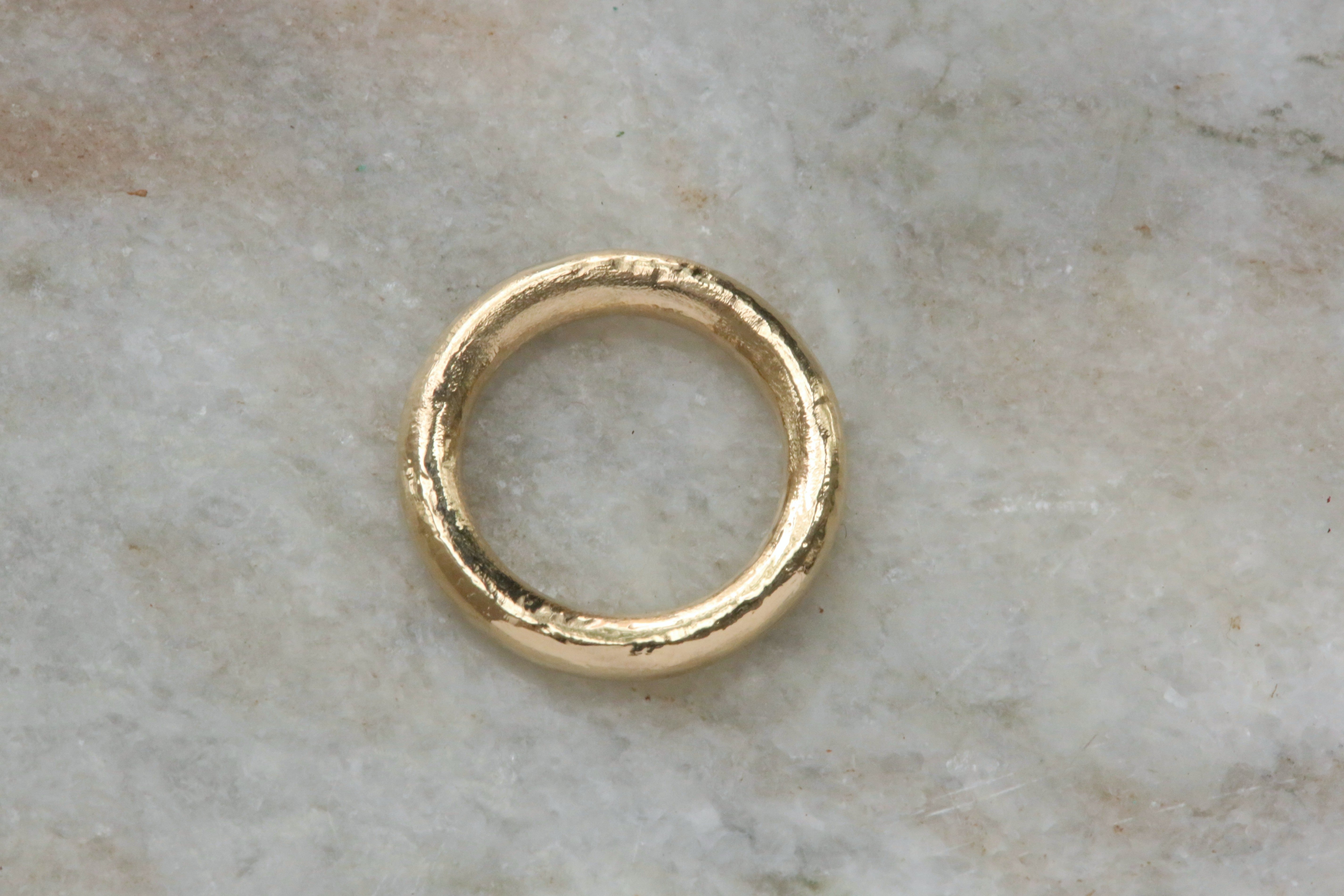 3mm round pinky ring in reclaimed 14 karat yellow gold. 