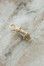 The Spire pendant shown in reclaimed 14 karat yellow gold with an elongated hexagon salt and pepper diamond. Create your own Spire Pendant with any jewel and gold of your choosing. 
