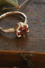 A resplendent being of light, the Utopia Heirloom Setting by The North Way Studio. Carved bark band and tapered leaf prongs, with a hidden world of carved vines and leaves on the setting walls. Shown in reclaimed 14 karat yellow gold and garnet. 

Create your own ring by using this listing to customize. 