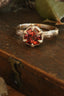 A resplendent being of light, the Utopia Heirloom Setting by The North Way Studio. Carved bark band and tapered leaf prongs, with a hidden world of carved vines and leaves on the setting walls. Shown in reclaimed 14 karat yellow gold and garnet. 

Create your own ring by using this listing to customize. 