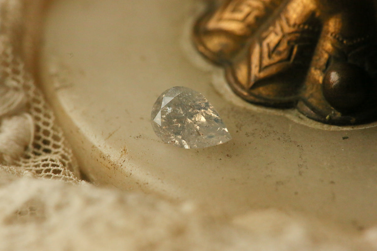 1.41 carat Pear Cut Opalescent Diamond