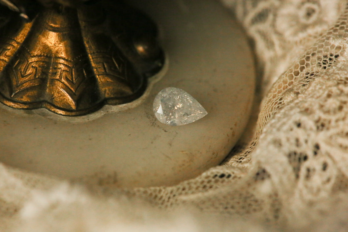 1.41 carat Pear Cut Opalescent Diamond