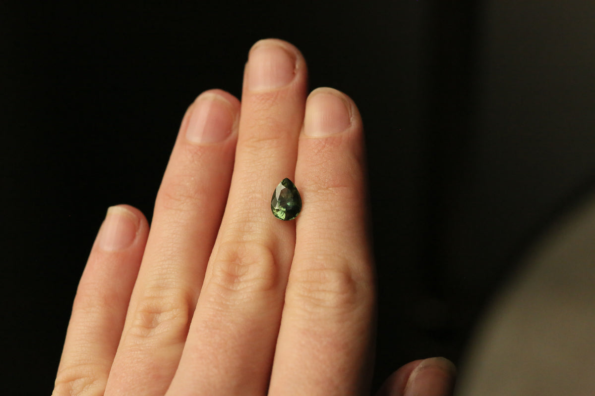 1.64 carat Forest Green Pear Sapphire