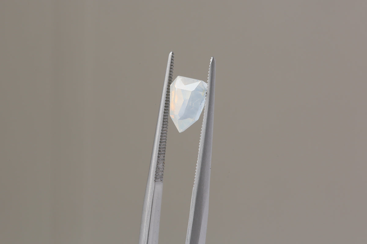 1.68 carats Opalescent White Shield Cut Sapphire