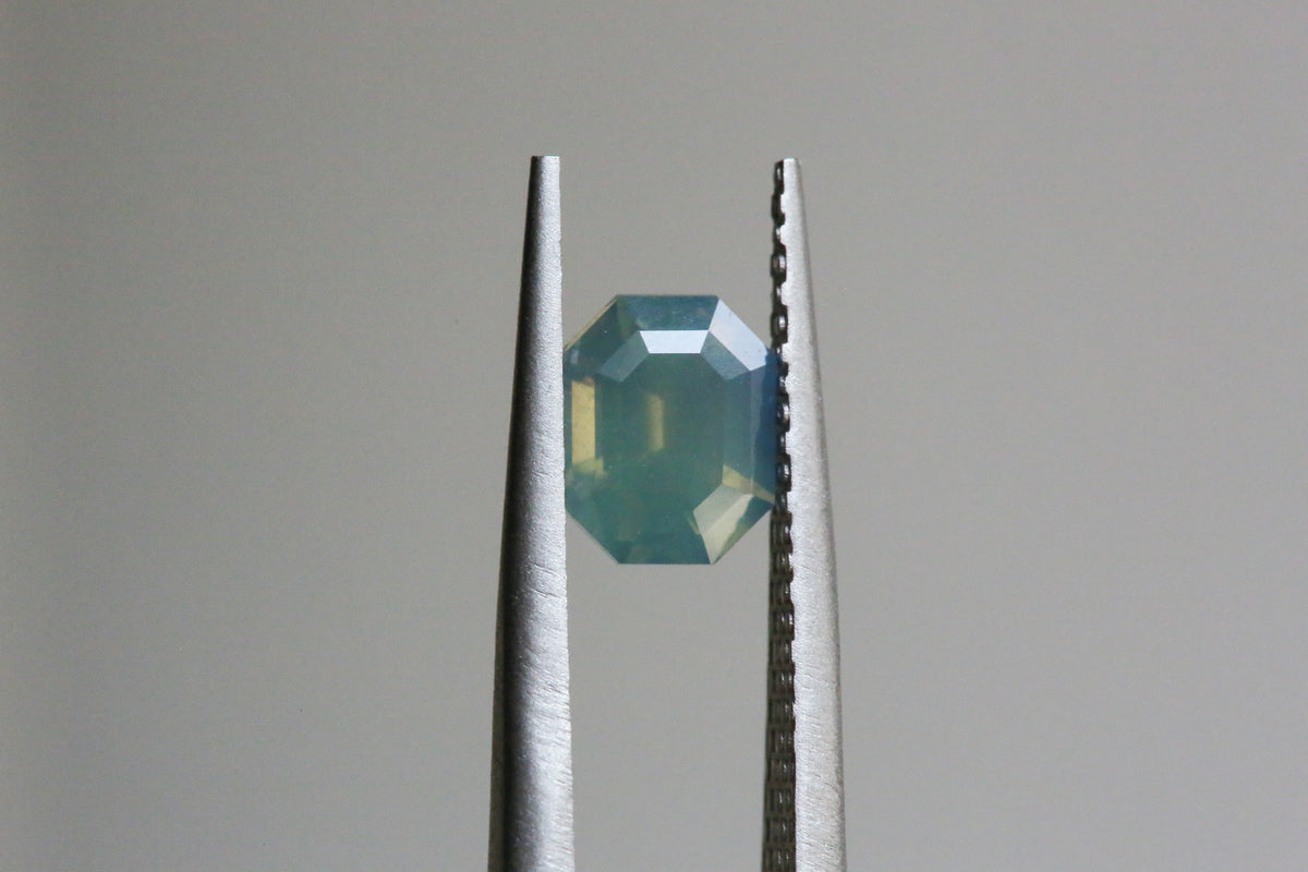RESERVED ON HOLD 1.32 carat Opalescent Green Emerald cut Sapphire