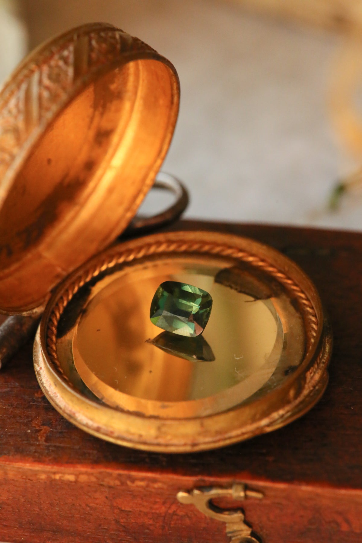 2.30 carat Blue Green Cushion Sapphire