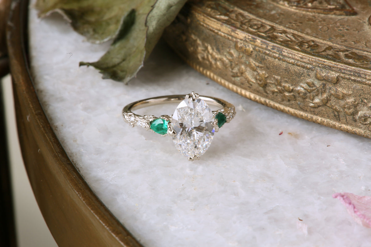 The Belladonna En Trois Ring in Natural Emerald and Lab Grown Diamond